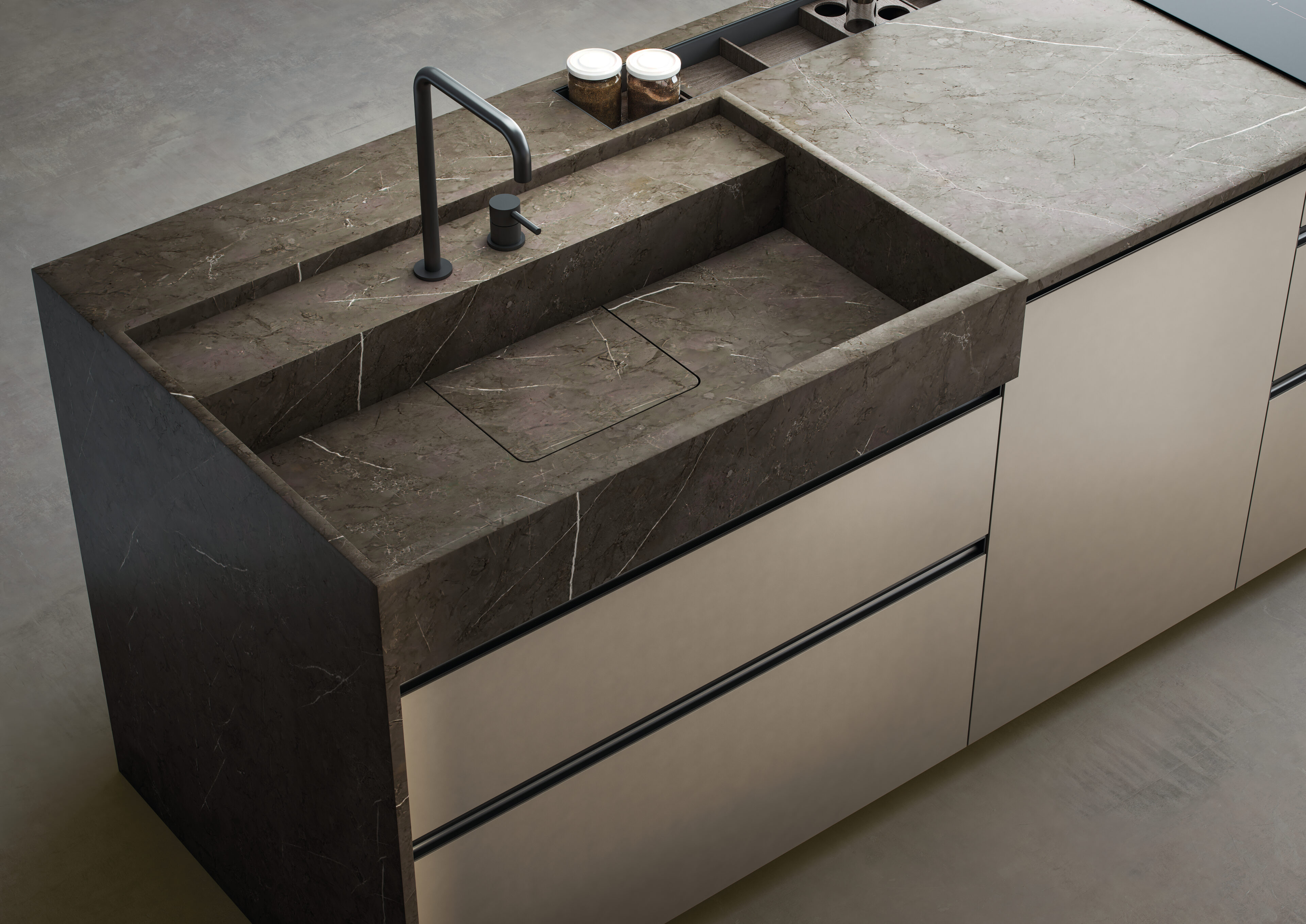 Una moderna encimera de cocina Nexo de granito oscuro con fregadero integrado, resaltando diseño y funcionalidad.