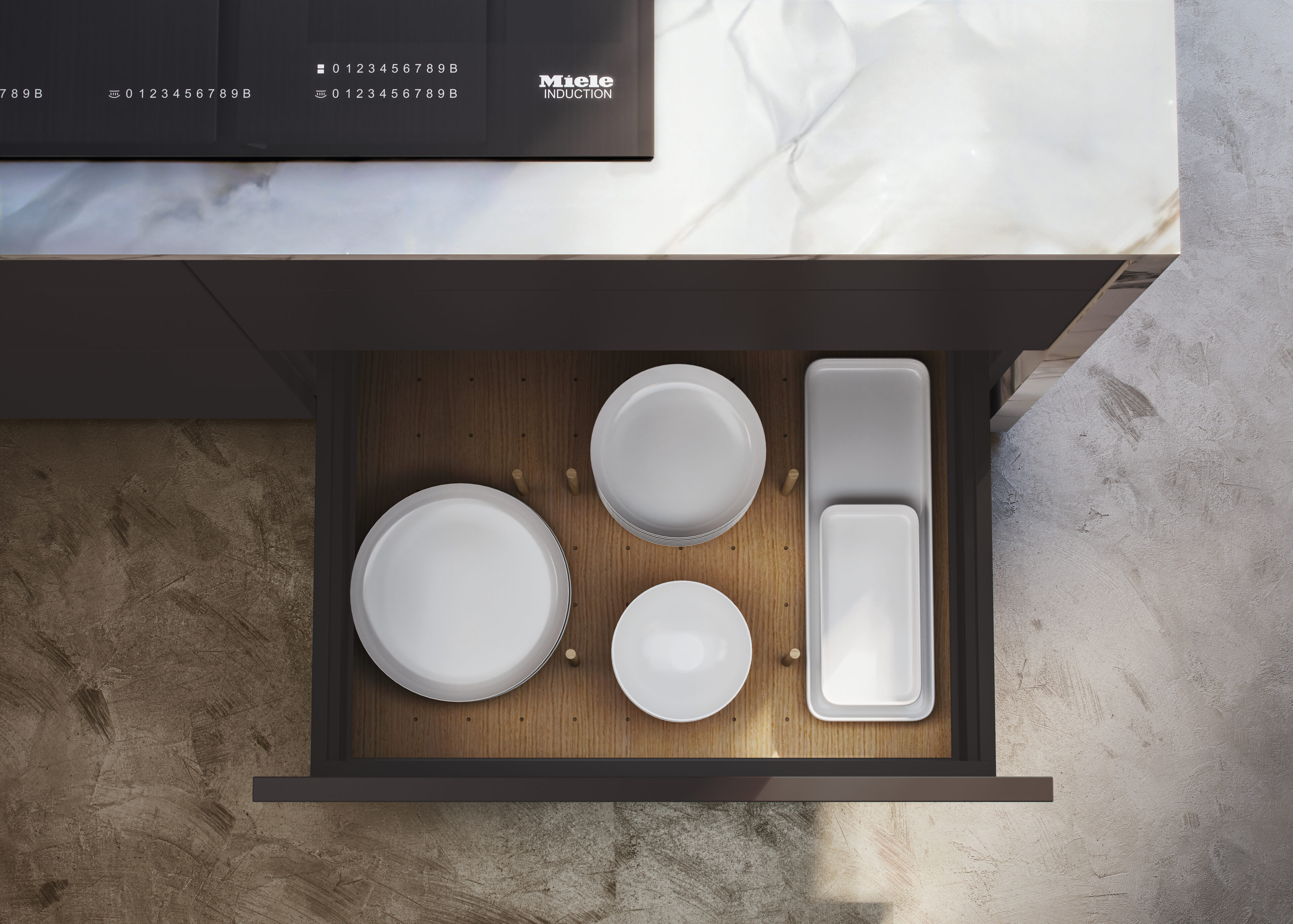 Cajón de cocina de Nexo Küchen con platos y bandejas, mostrando diseño funcional y estético con materiales de calidad.